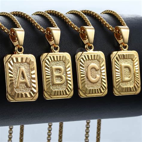 gold letter necklace pendant.